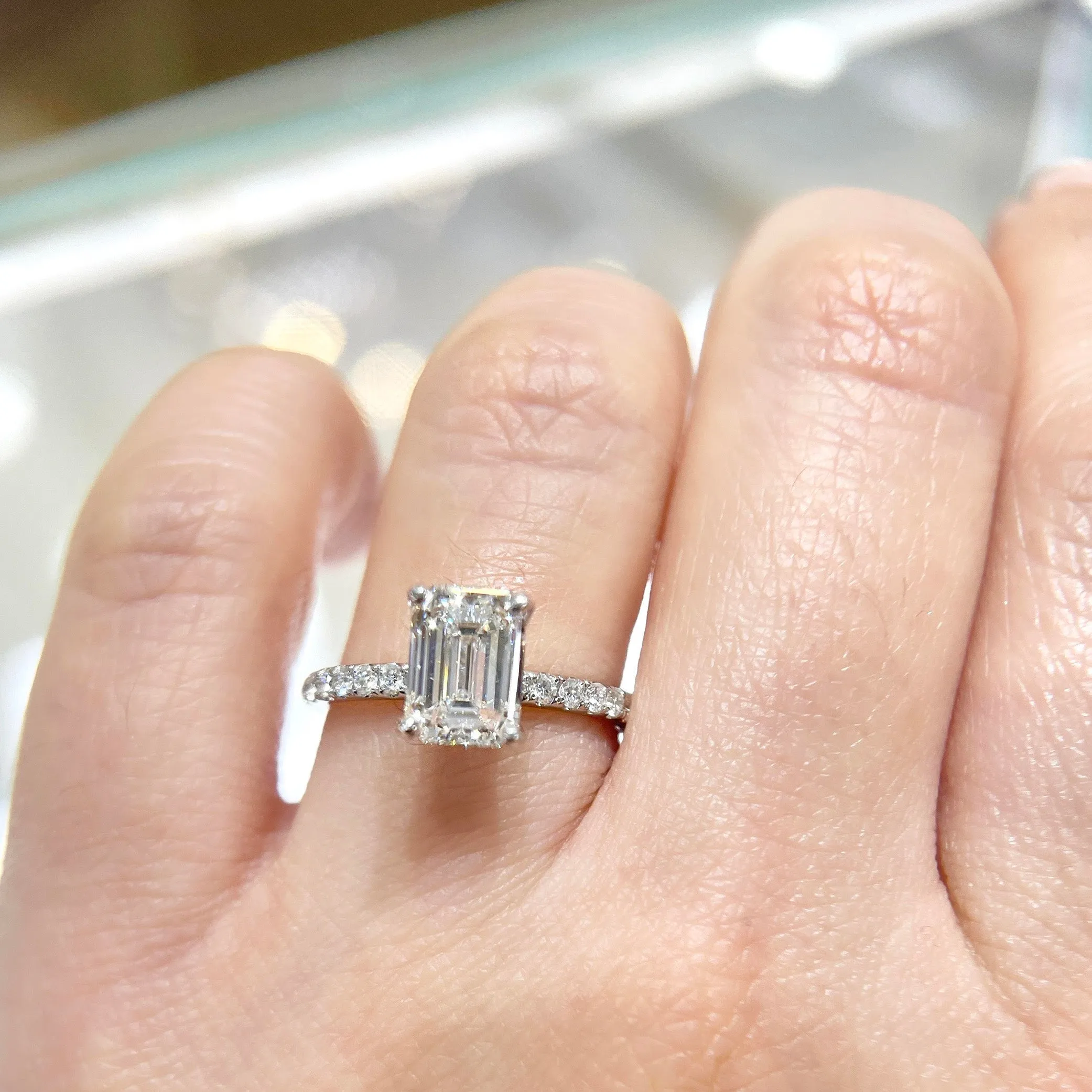 2 ct Certified Emerald Cut Lab-Diamond 18K white Gold Side-Diamond Engagement Ring