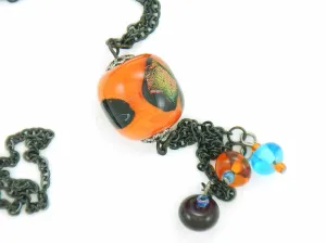 27-inch necklace with elongated glass ball and matching pendants in bright orange-black-blue (Murano-style glass handmade in Montreal), black stainless steel chain