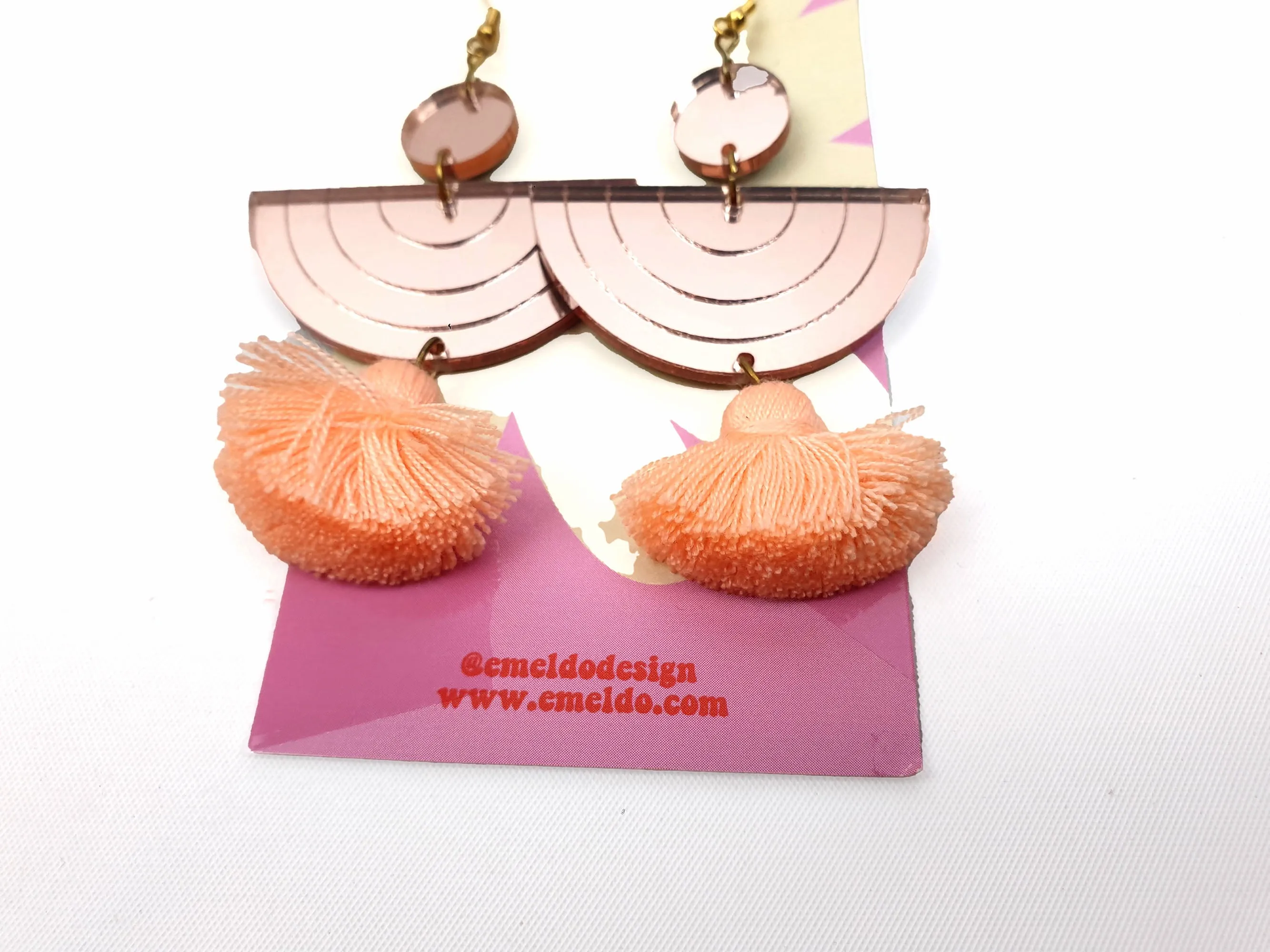 Emeldo gold half moon drop earrings with peach detail