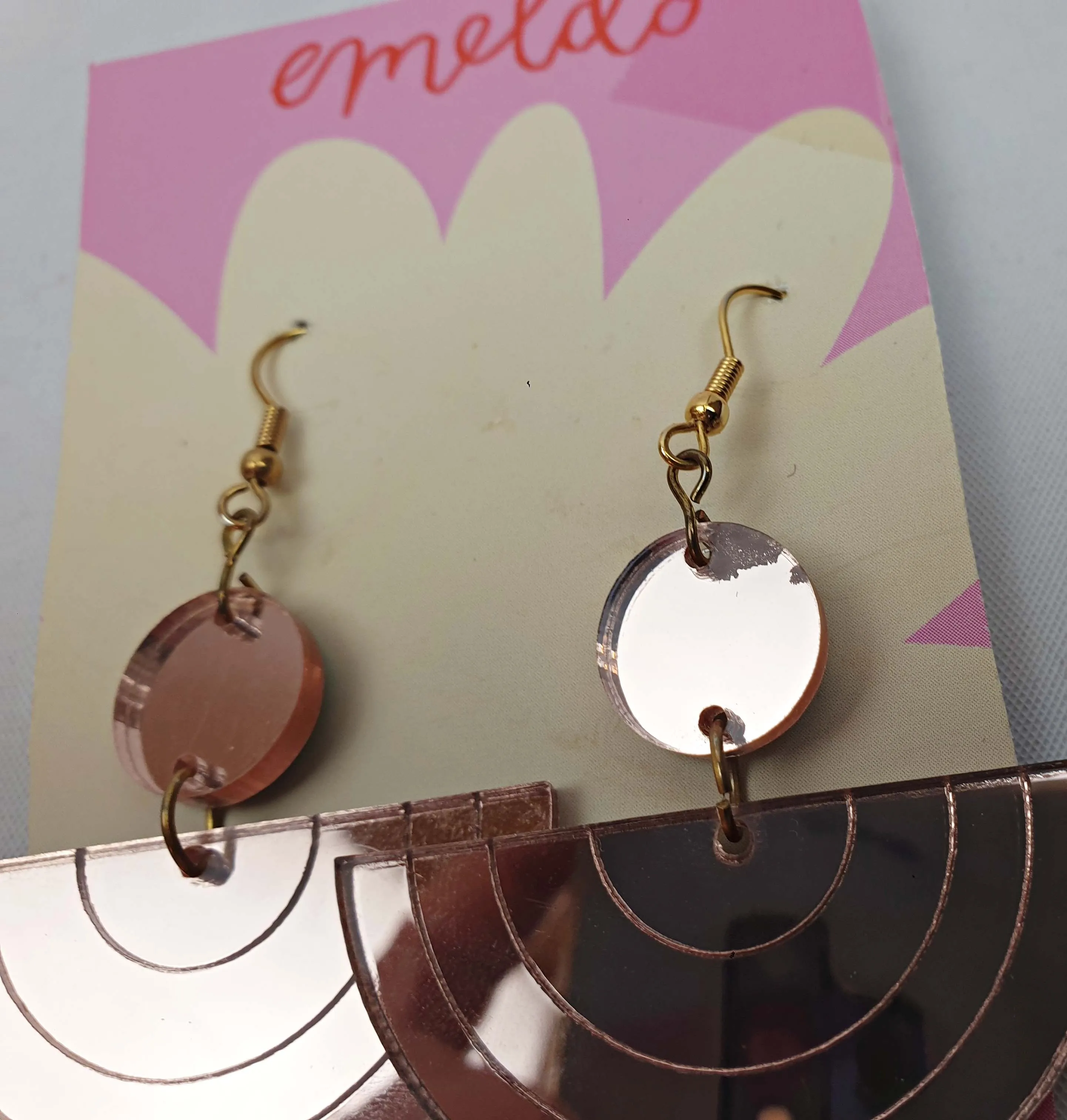 Emeldo gold half moon drop earrings with peach detail