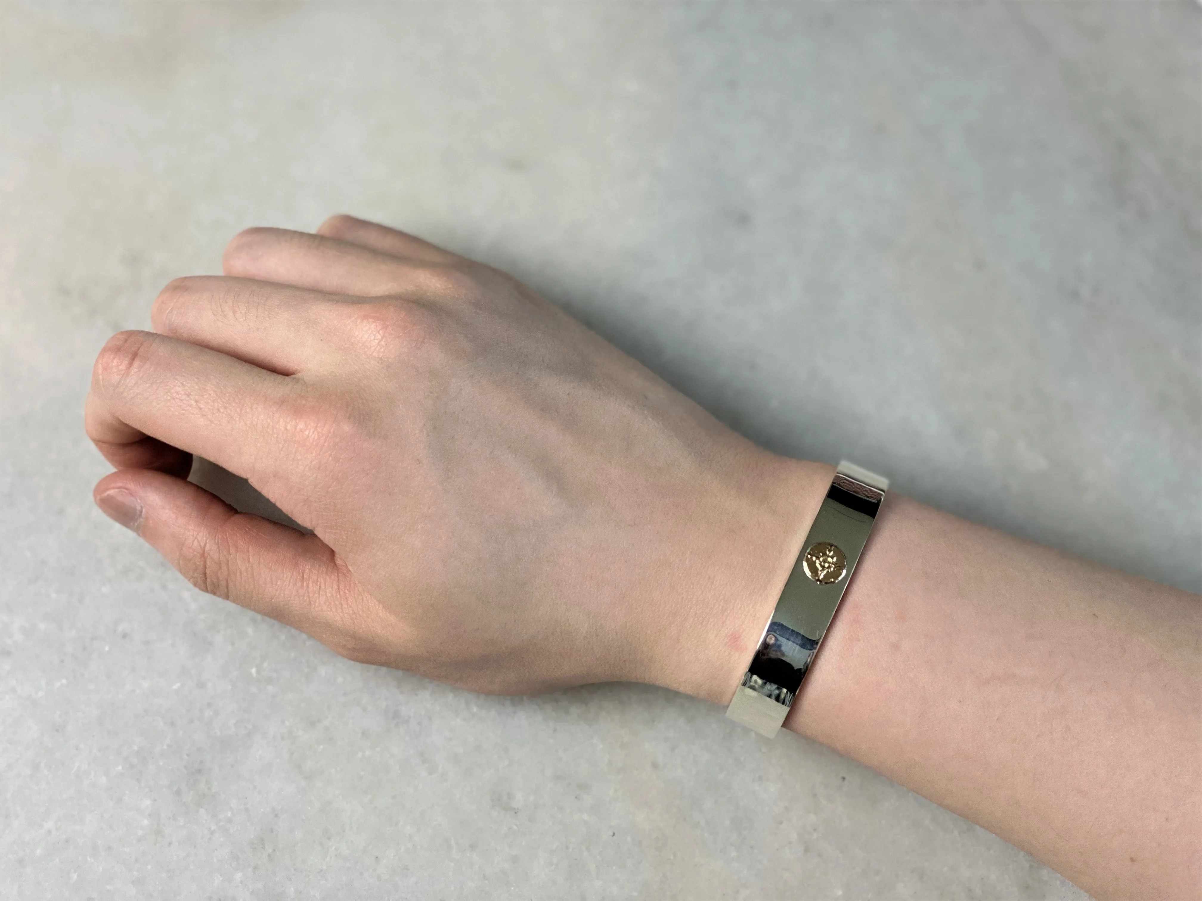 First Arrow's 12mm 'Classic' Bangle With 18K Sunburst Emblem (BR-001)