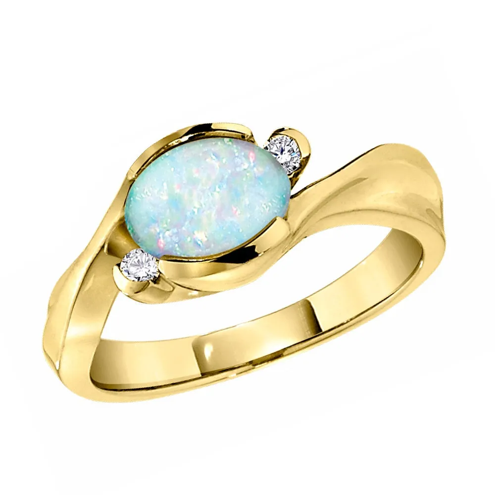 Modern Bypass Blue Topaz and Diamond Ring