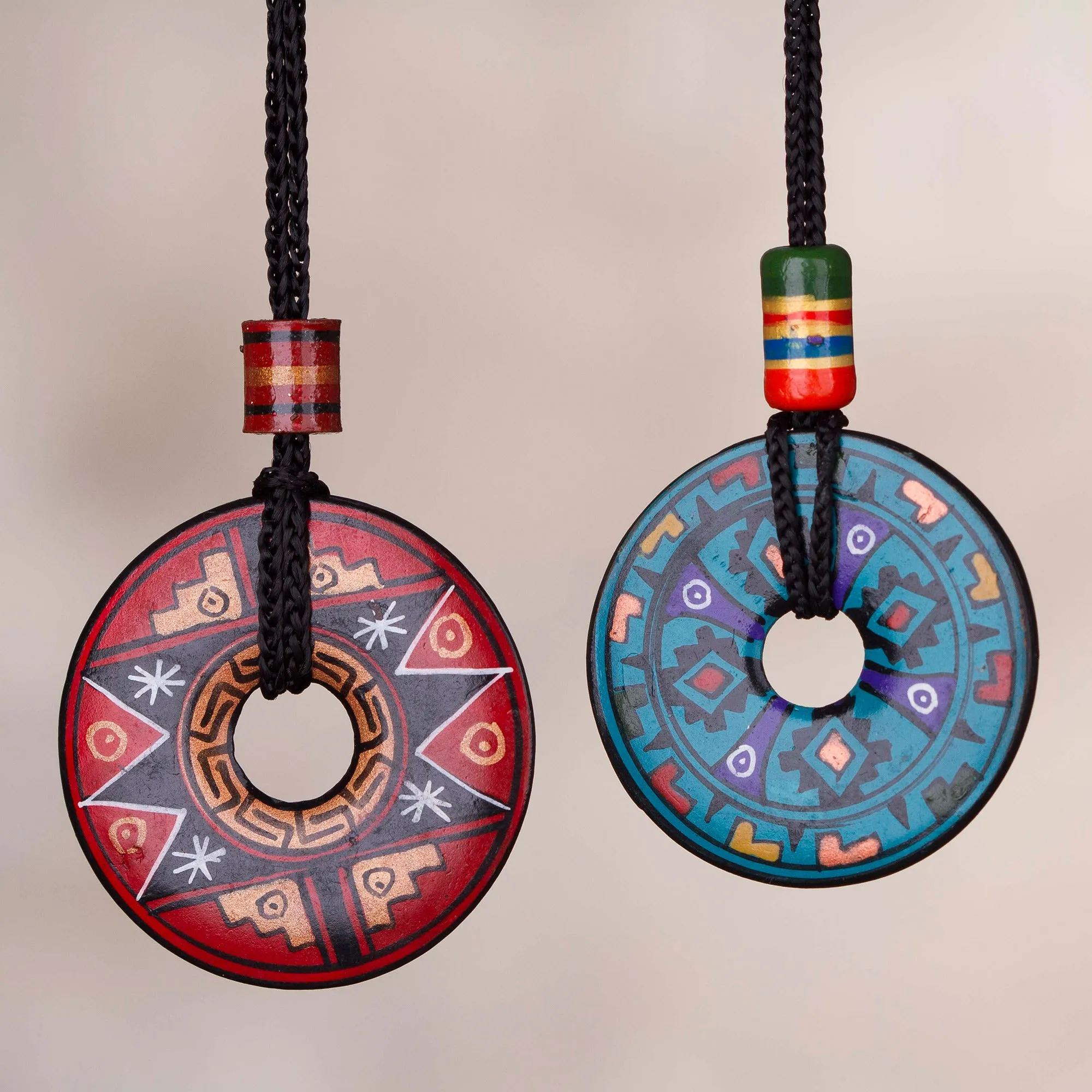 Pair of Red and Blue Ceramic Pendant Necklaces from Peru - Sun and Rain | NOVICA